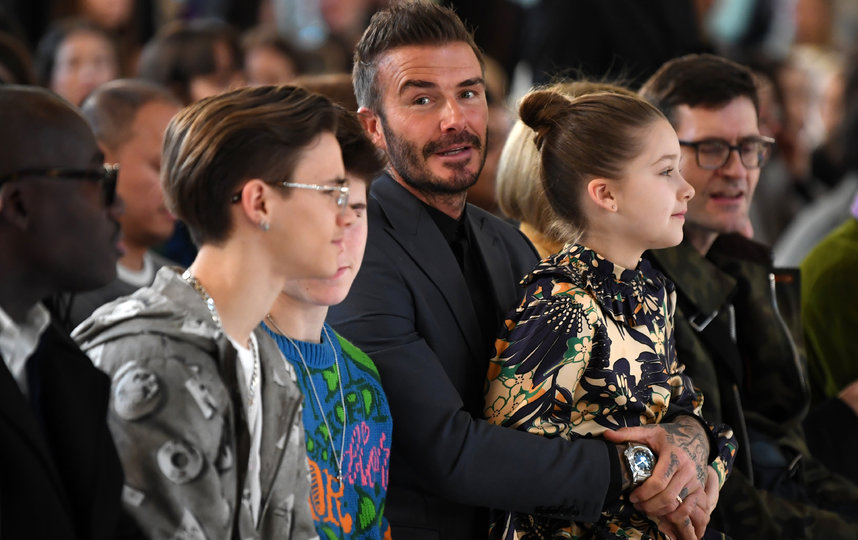 Дэвид Бекхэм с сыновьями Ромео и Крузом и дочерью Харпер. Фото AFP