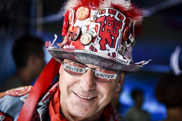 Фанаты готовятся к матчу "Реал" Мадрид – "Манчестер Юнайтед" 8 августа 2017 года. Фото AFP