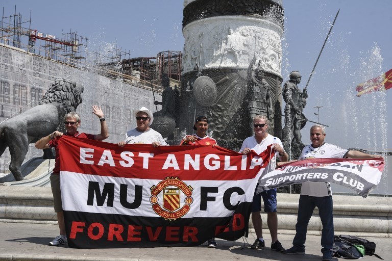 Фанаты готовятся к матчу "Реал" Мадрид – "Манчестер Юнайтед" 8 августа 2017 года. Фото AFP