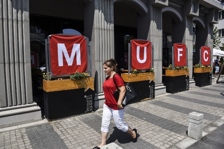 Фанаты готовятся к матчу "Реал" Мадрид – "Манчестер Юнайтед" 8 августа 2017 года. Фото AFP