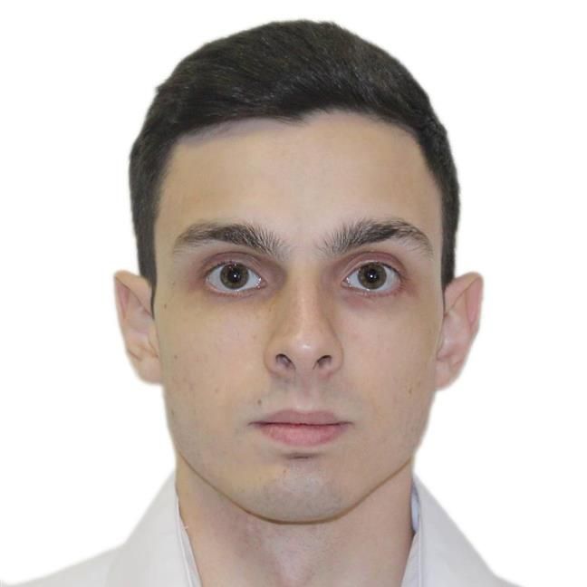 Роман Резников