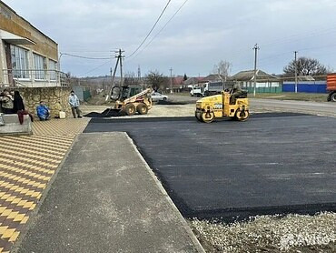Работы по асфальтированию