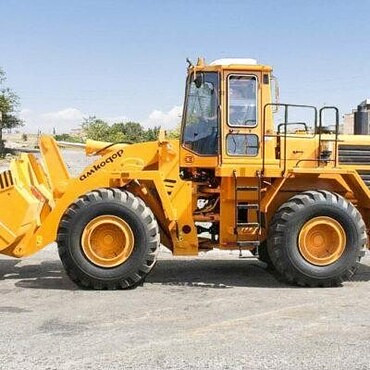 Caterpillar, Hitachi, АМКОДОР