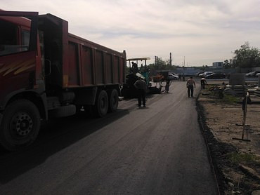 Работы по асфальтированию