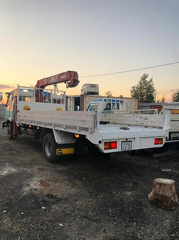 Доставка строительных материалов манипулятором