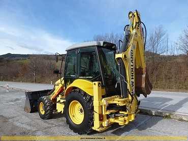 NEW HOLLAND В 110 + гидромолот