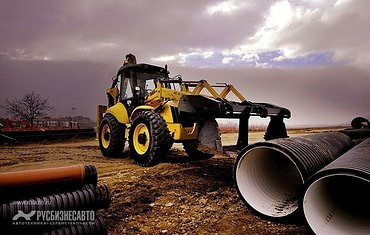 New Holland  B115B