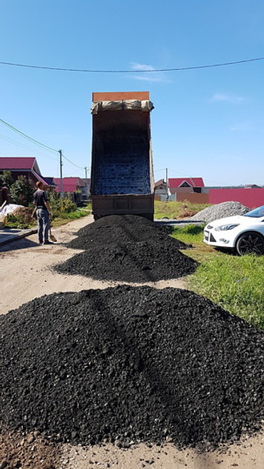 Работы по укладке асфальта