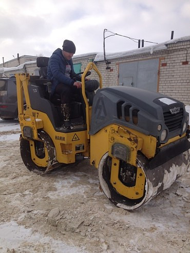 Работы по укладке асфальта