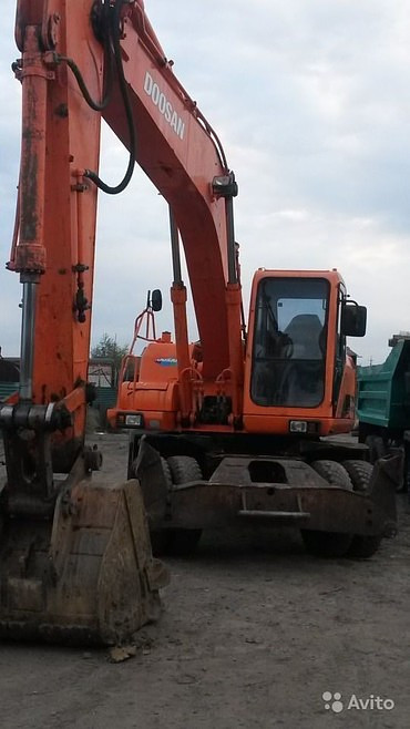 Doosan 210