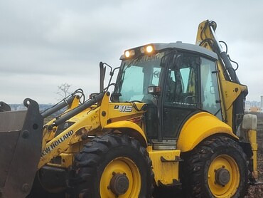 New Holland b 115
