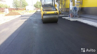 Работы по укладке асфальта