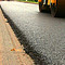 Работы по укладке асфальта
