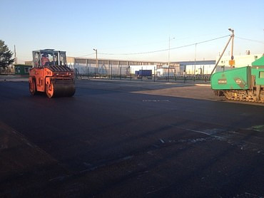 Работы по укладке асфальта