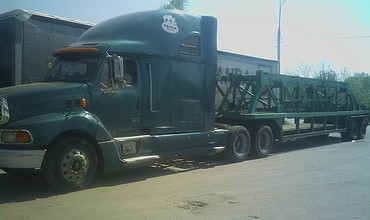 Перевозка плит панелевозом