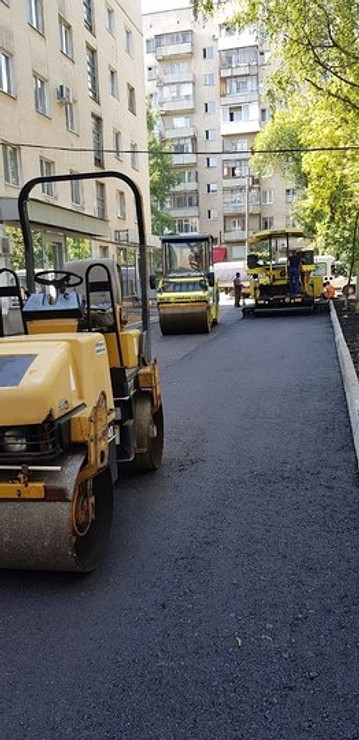 Работы по асфальтированию