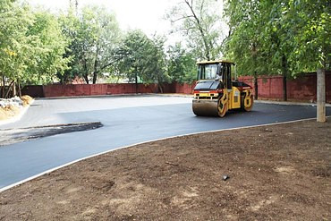 Работы по укладке асфальта