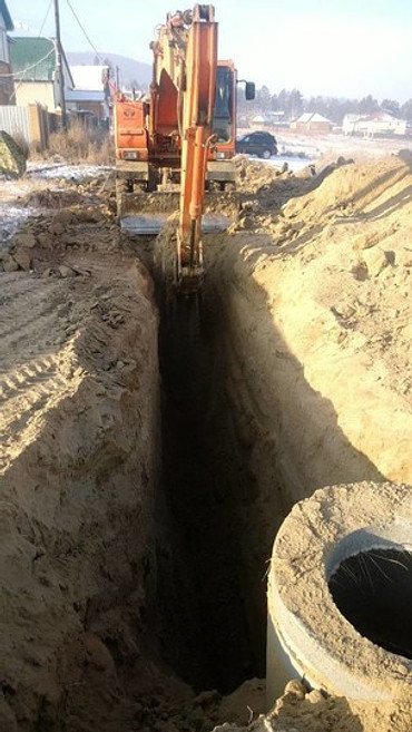 УСЛУГИ  КОЛЕСНОГО ЭКСКАВАТОРА 