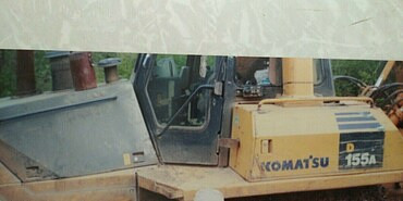 Коматцу D-65EX-12