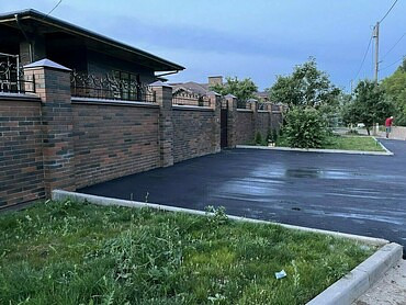 Работы по укладке асфальта