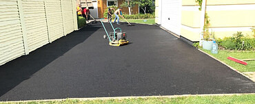 Работы по укладке асфальта