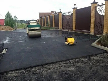 Работы по асфальтированию