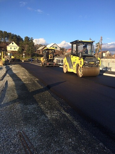 Работы по укладке асфальта