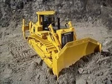 John Deere 850J, Коматсу