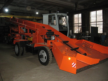 Снегопогрузчик лаповый КО-206М