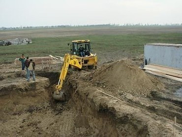 Разработка котлованов, копка траншей, бурение ям