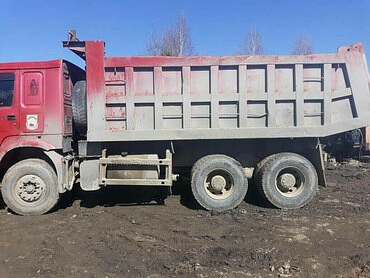 Услуги по вывозу строительного мусора