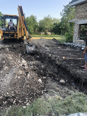 Разработка котлованов, траншей, планировка