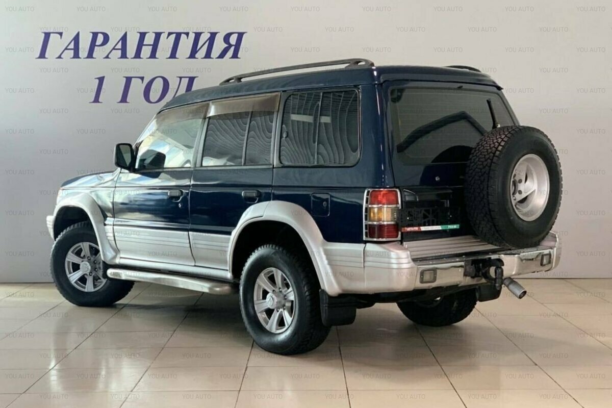 Монтеро москва. Митсубиси Монтеро 1995. Mitsubishi Montero 2. Митсубиси Монтеро 1995 года. Mitsubishi Montero 1995 Blue.