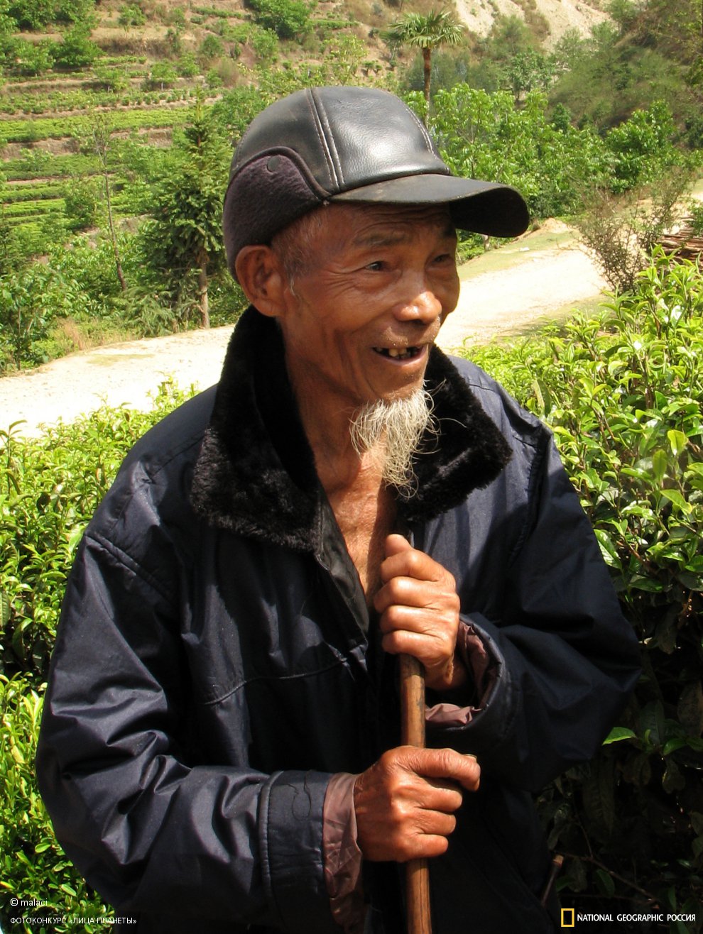 Пожилой крестьянин народности наси из провинции Юньнань