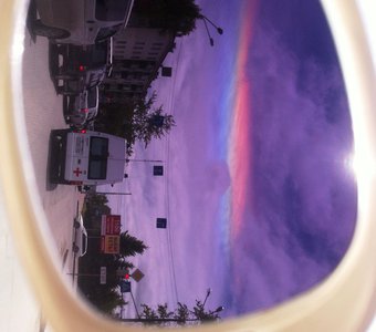 Редчайшее атмосферное явление - "огненная радуга" в небе над Южно-Сахалинском