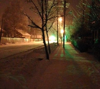 Свет светофора сквозь снежинок