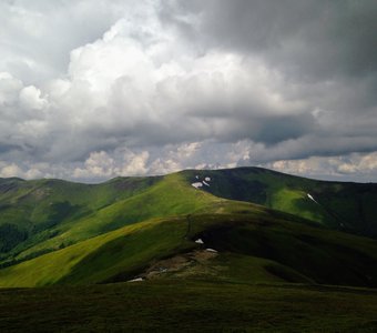 Mountain`s landscape with cloudy sky