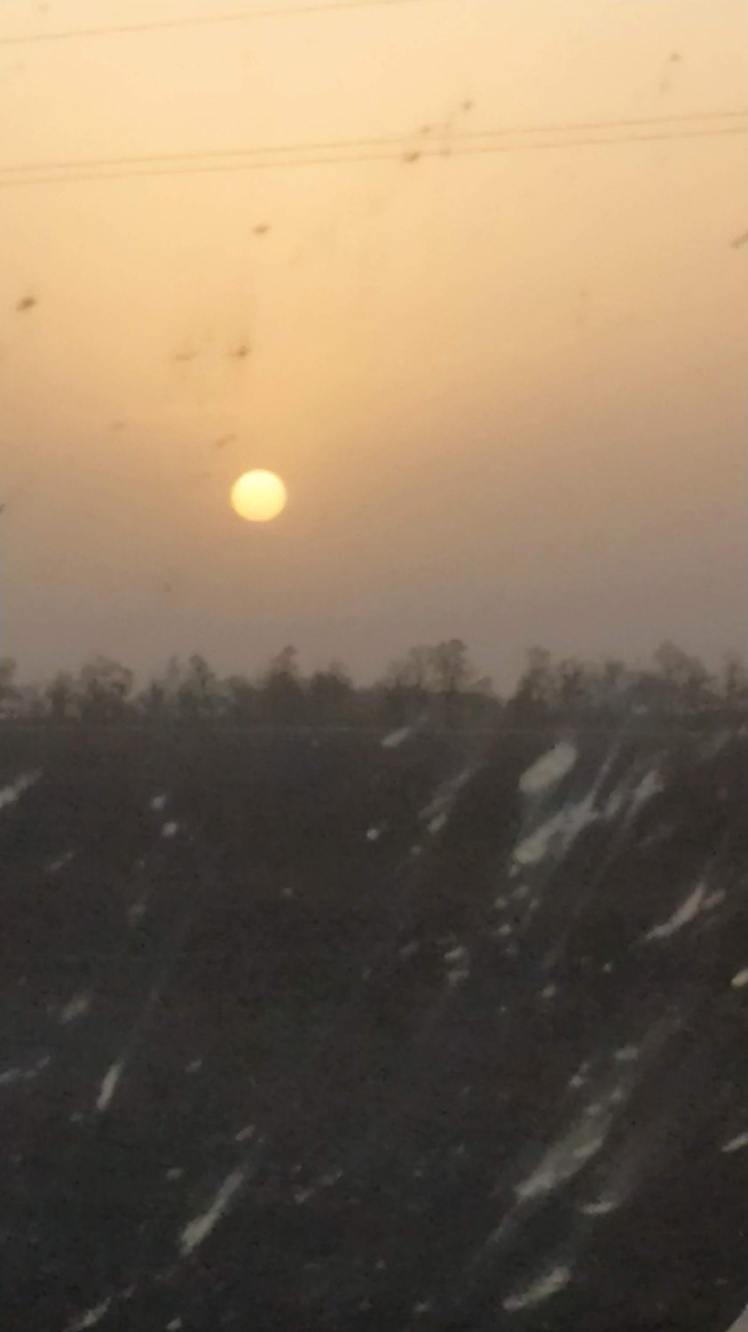 Пыльное солнце Ростова сквозь лобовое стекло