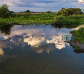 Облака в реке купаются