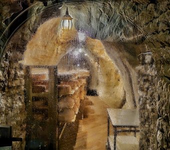 Созревающие сыры в пещерах Псково-Печерского монастыря