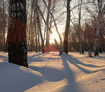 Закат позолотил снега