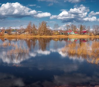 под облакми