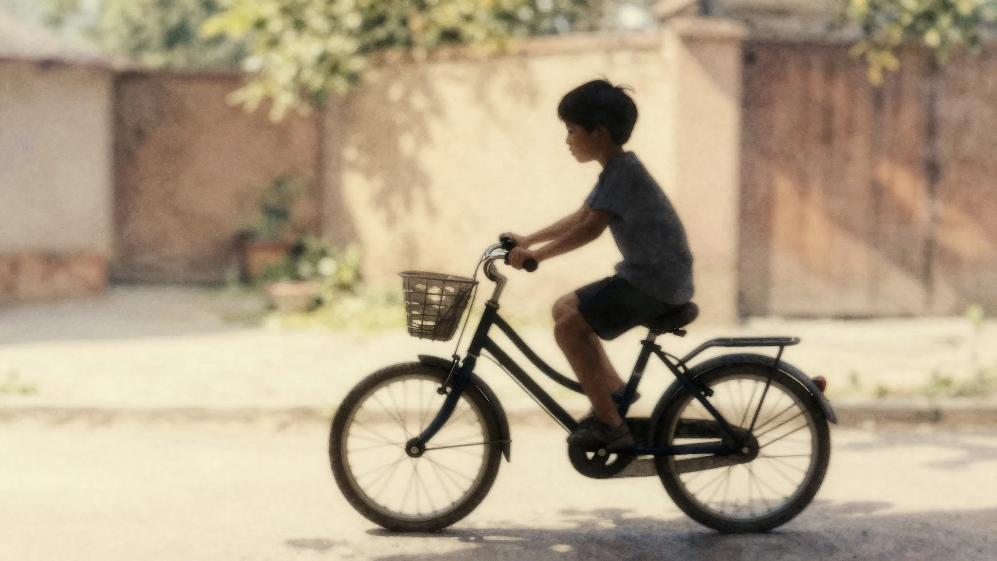 Watercolor style. A silhouette of a child riding a bicycle i...