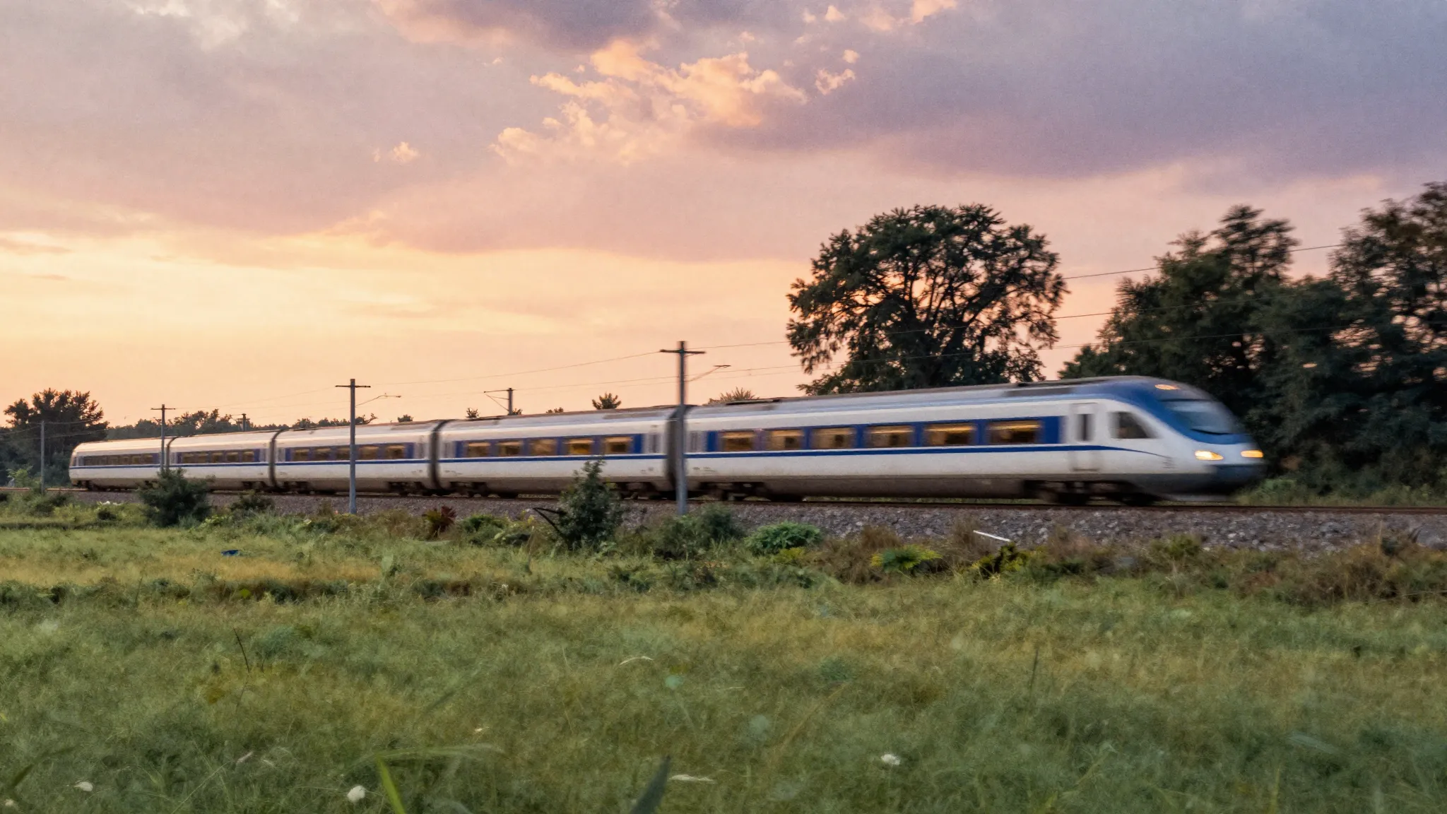 Watercolor style. A fast train moving through a vast landsca...