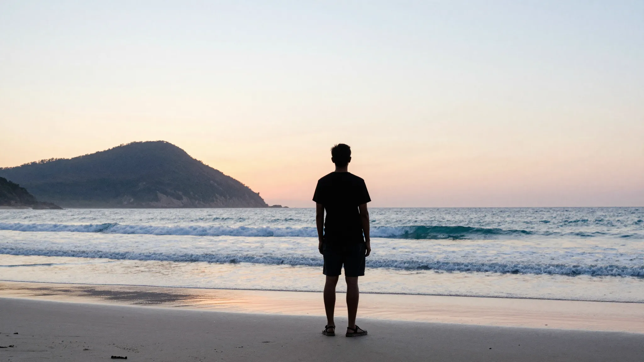 Watercolor style. Silhouette of a person standing on a beach...
