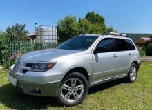 Реснички на фары MITSUBISHI OUTLANDER 2002-2006