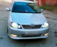 Реснички на фары для Toyota Corolla NZE 121 2000-2005 седан