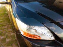 Реснички на фары для Toyota Belta 2005-2012 NCP96