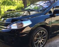 Накладки на передние фары (реснички) для Nissan Tiida (хэтчбек) 2008-2014