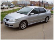 Накладки на фары (реснички) для Mitsubishi Lancer 9
